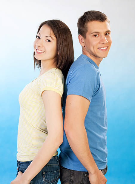 istock Smiling teenage couple. 184973330