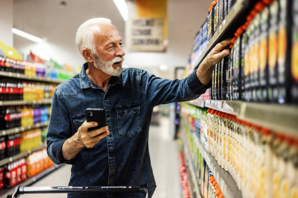 istock Male customer checking shopping list on his smartphone. 1849733662