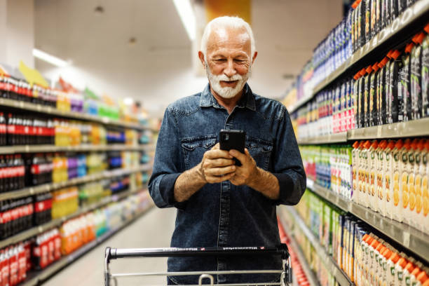 istock Male customer checking shopping list on his smartphone. 1849733669
