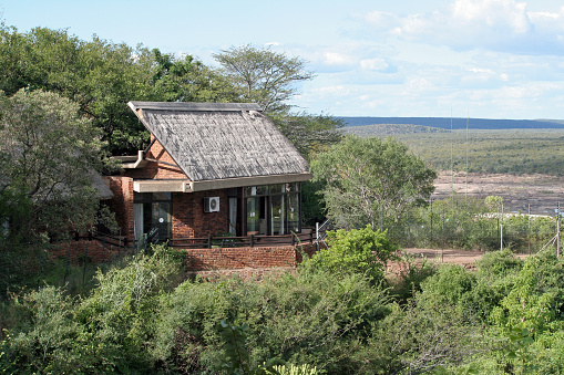 Letaba Rest Camp, Kruger National Park, South Africa - April 14, 2012 : view from  lookout post over Olifants river showing one bungalow