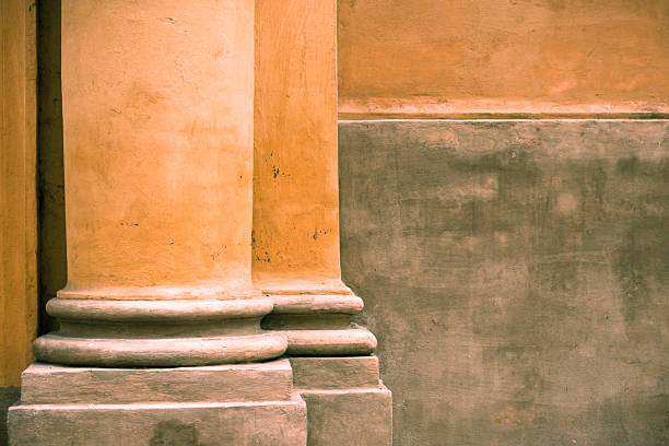 istock Yellow Columns on Plaster Wall, Architectural Detail in Italy 184973832