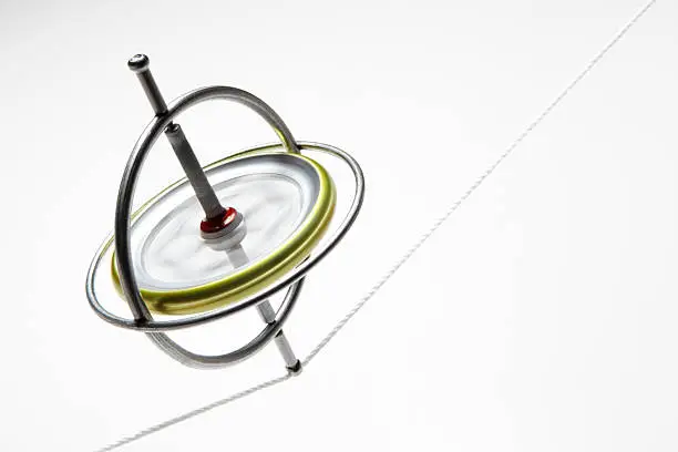 A spinning gyroscope on a string.