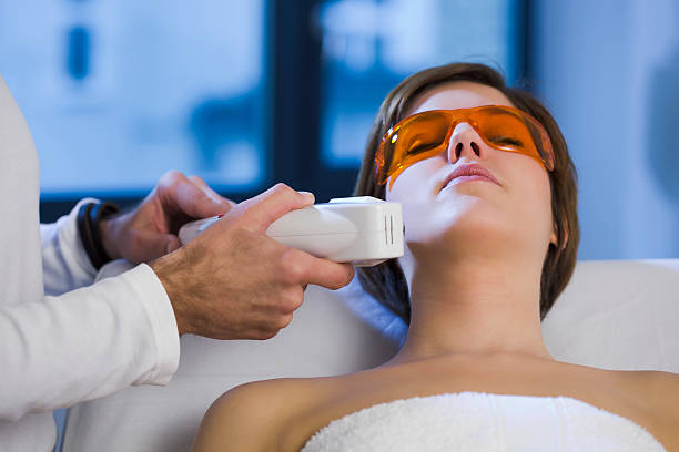 Woman getting Electrolysis Treatment on her Face stock photo