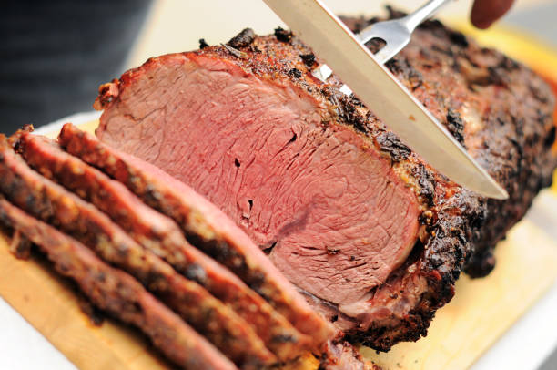 costola arrosto di prima scelta - roast beef roasted spit roasted roasted prime rib foto e immagini stock