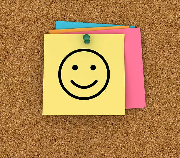 Corkboard with Sticky Notes and Smiley Face