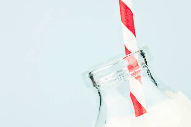istock Milk Bottle and Old Fashioned Straw 184975482