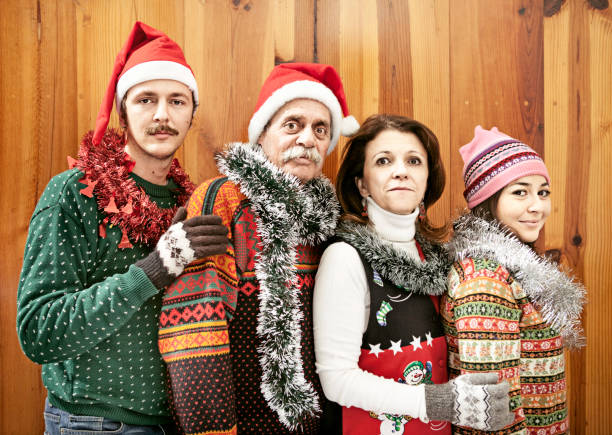Xmas kitsch portrait Portrait of a family in Christmas time. kitsch photos stock pictures, royalty-free photos & images