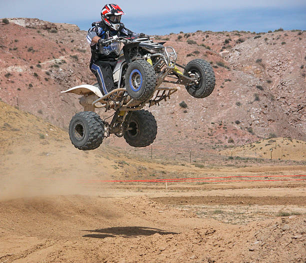 flying quatre-wheeler - fourwheeler photos et images de collection