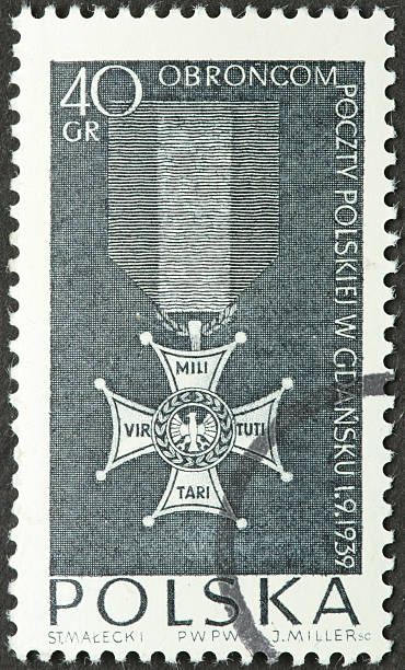 istock Polish military medal on an old postage stamp 184976455