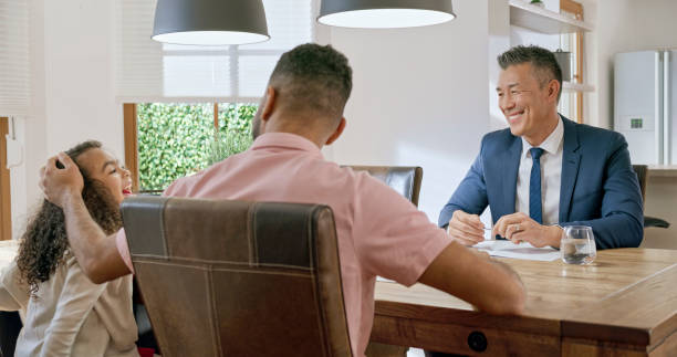 istock Financial advisor and father looking his daughter 1849766761