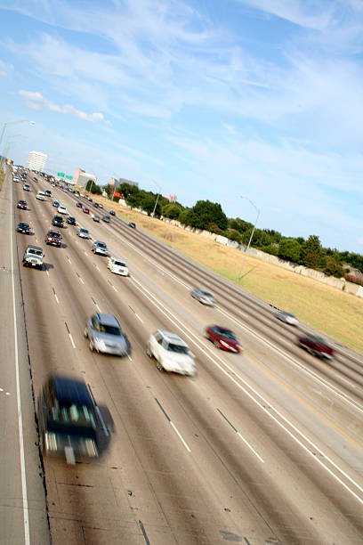 istock Vehicles Speeding Down A Highway During The Day 184977244