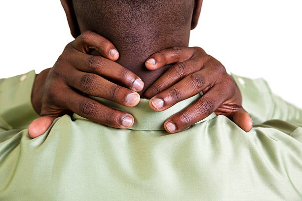 istock Man massaging his neck in pain 184977268