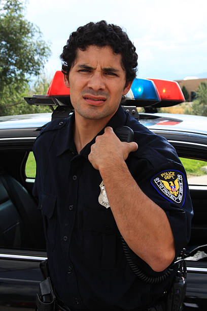 istock Police Officer on Radio 184977339