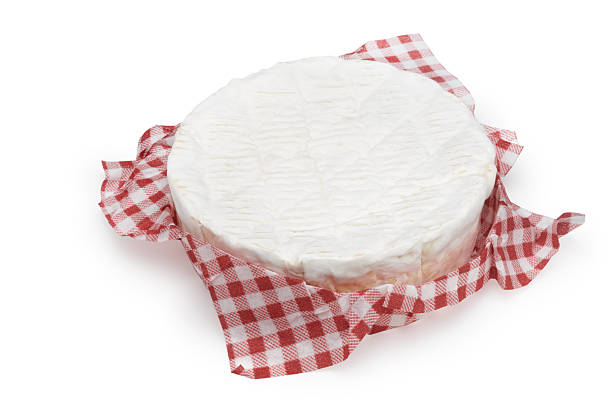 Ripe camembert isolated on white.