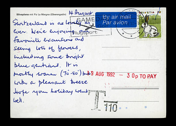 Underpaid postcard from Samedan, Switzerland, 1992 "A postcard from Samedan, Switzerland, posted in 1992. The sender failed to use the correct postage, leaving the British recipient with 30 pence to pay." samedan stock pictures, royalty-free photos & images