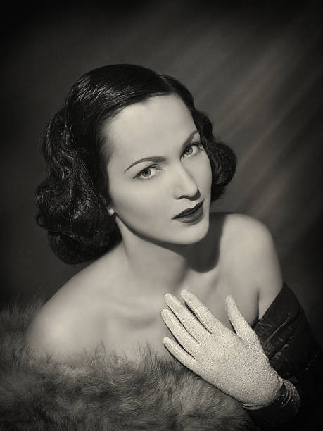 Beauty in film noir style "Emulation of vintage style photography,Filters,grain and noise add for more effect.See the Lightbox:" innocent actor stock pictures, royalty-free photos & images