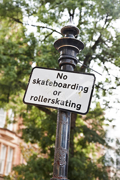 istock City lamp post with no skateboarding sign 184978599