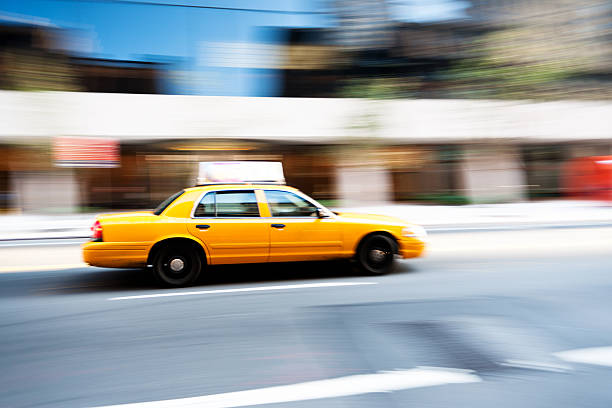 istock Yellow cabs speeding down the road 184978788