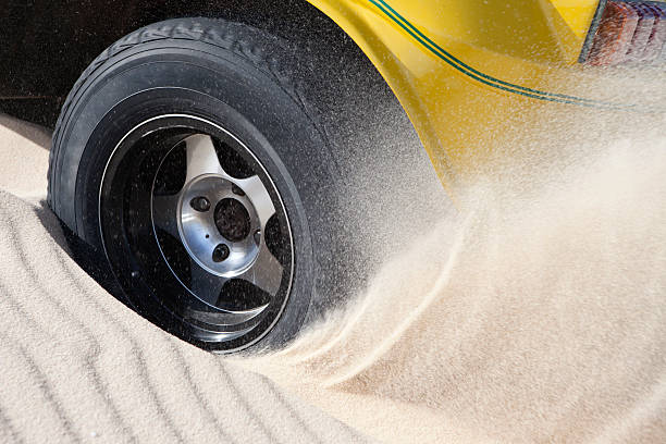 Black tires on the beach