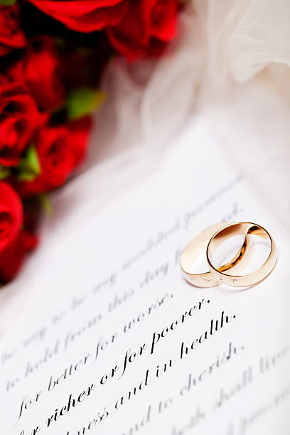 istock Wedding Rings, Vows and Red Rose Bouquet 184979263