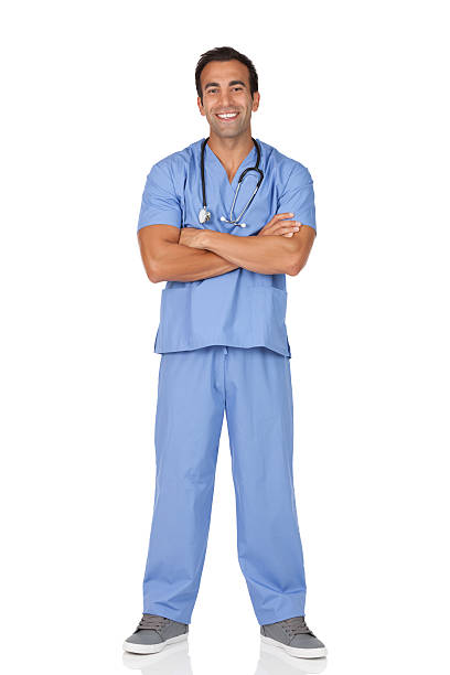 Male surgeon standing with his arms crossed stock photo
