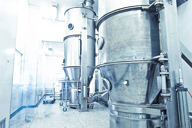 istock pharmaceutical factory equipment working 184979672