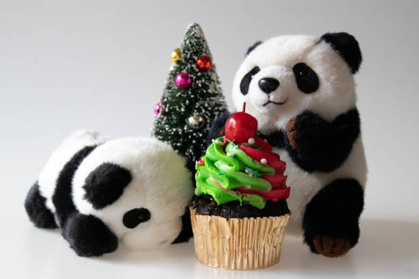 istock Christmas Celebration with Chocolate Cup Cake and a panda 1849801026