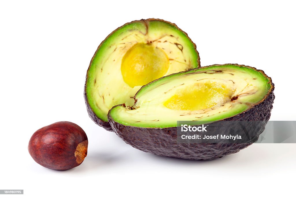 Aguacate a la mitad - Foto de stock de Aguacate libre de derechos