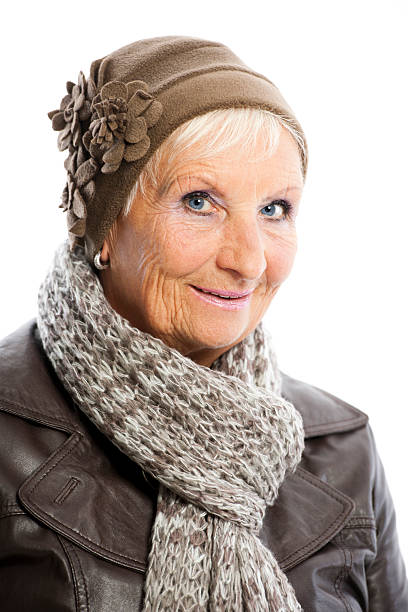 istock Senior woman with cap and scarf 184980241