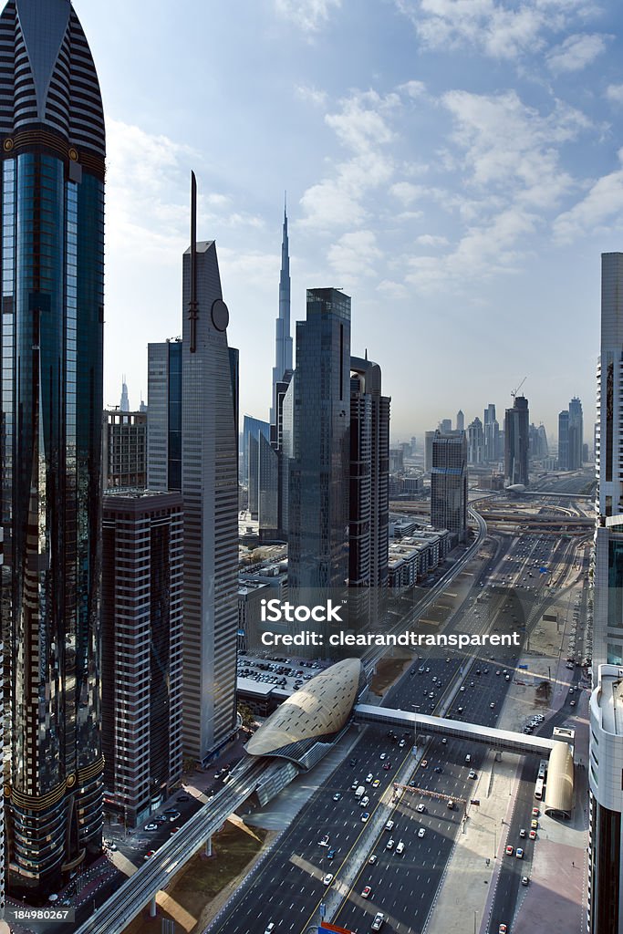 Dubai "In the centre is Shk Zayed Rd, a monorail station bottom left, worlds tallest building - Burj Khalifa in the centre back.Please see some more Dubai at night images from my portfolio:" Traffic Circle Stock Photo