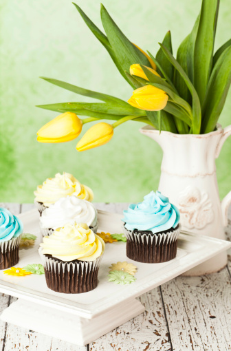 Easter cupcakes with beautiful spring tulips