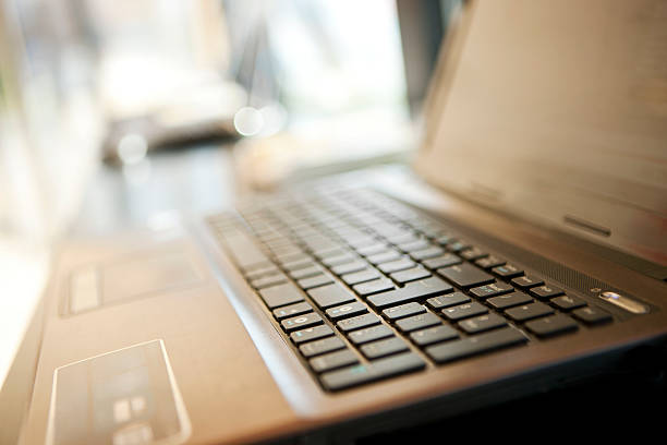 Electronics store "Laptop on display in electronics store, Canon 1Ds mark III" computer store stock pictures, royalty-free photos & images