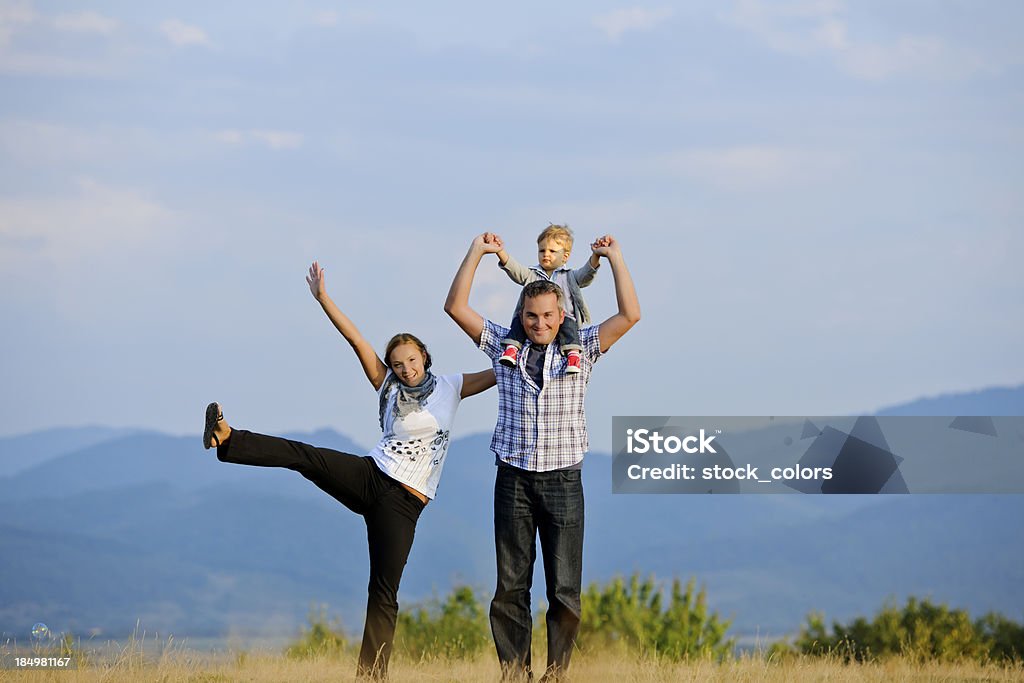 happy family happy family in field having fun. 2-3 Years Stock Photo