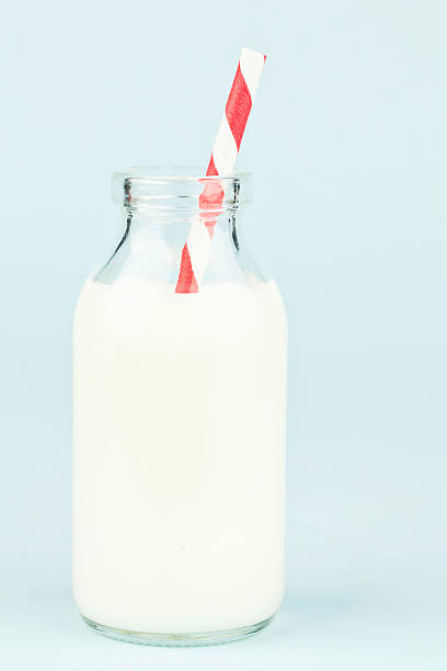 istock Milk Bottle and Old Fashioned Straw 184981212