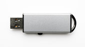 Isolated shot of silver USB Flash Drive on white background