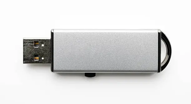 Photo of Isolated shot of silver USB Flash Drive on white background