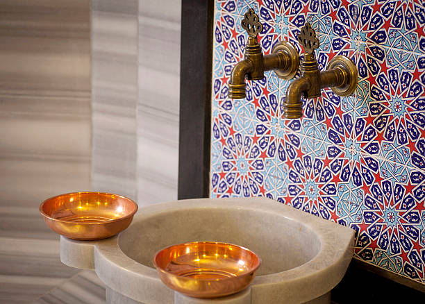 Faucets for washing in Turkish Hamam stock photo