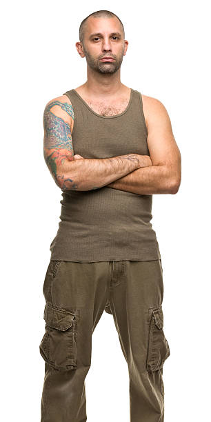 istock Tough Tattooed Guy Three Quarter Portrait 184982044