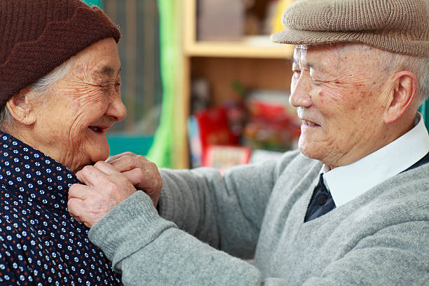 istock happy grandparents together 184982206