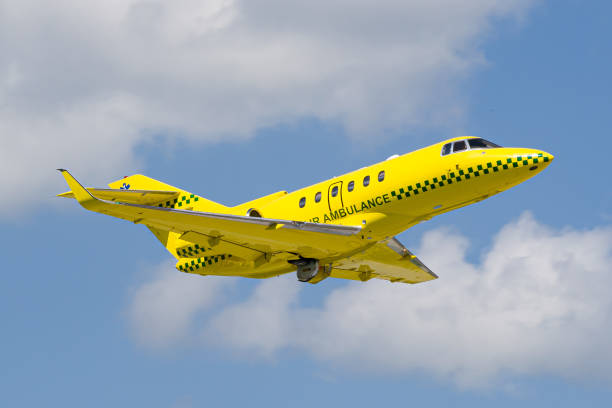 Private yellow Air Ambulance aircraft takeoff