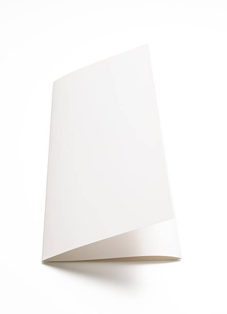 istock Isolated shot of blank folded paper on white background 184982859