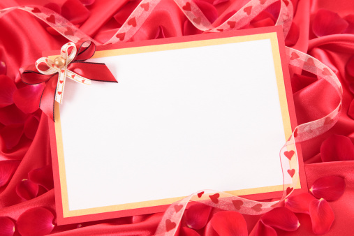 Valentine card with ribbon and rose petals.Alternative image in this collection: