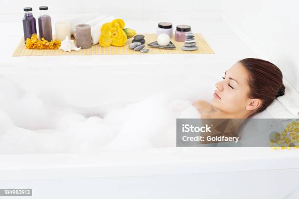 Beautiful Young Woman Relaxing In Bathtub Stock Photo - Download Image Now - 20-29 Years, Adult, Adults Only