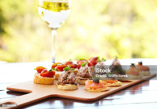 Bruschetta With Cheese Tomatoes Foie Gras And Wild Salmon Stock Photo - Download Image Now