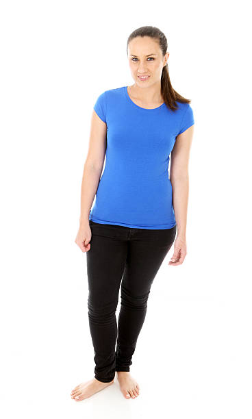 istock Young woman in blank blue shirt 184984289