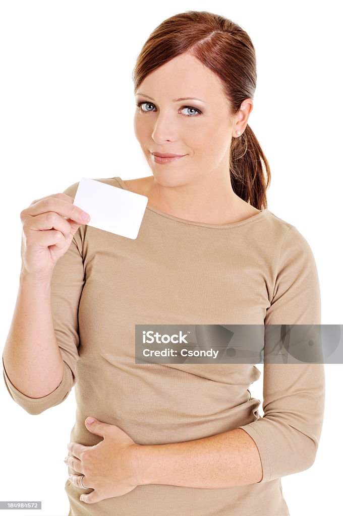 Junge schöne Frau holding a business card - Lizenzfrei Attraktive Frau Stock-Foto