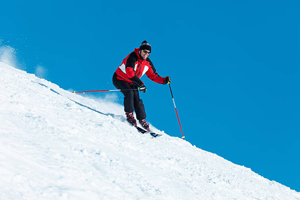 istock Skier at the top of a Mountain 184985053