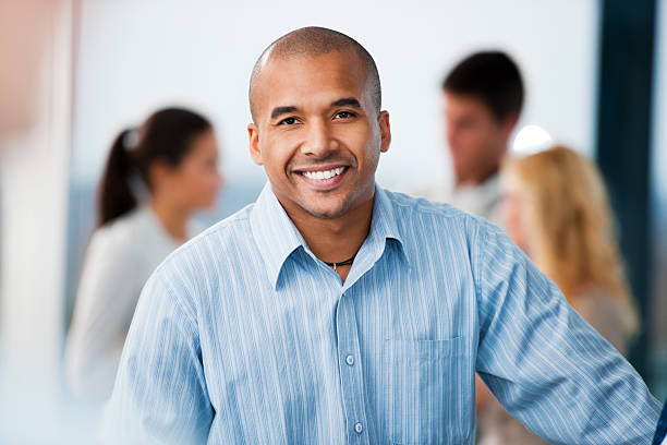 istock African-American businessman looking at camera. 184985248