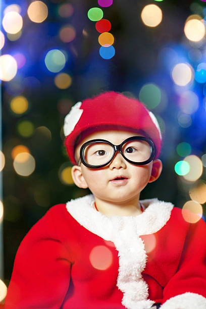 istock Baby boy in Christmas dress 184985523