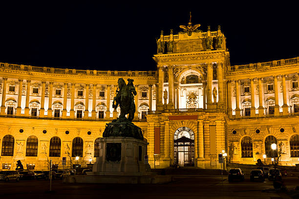 istock Hofburg palace at night 184985770
